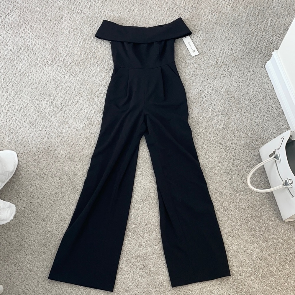 Black off the shoulder jumpsuit with pockets!